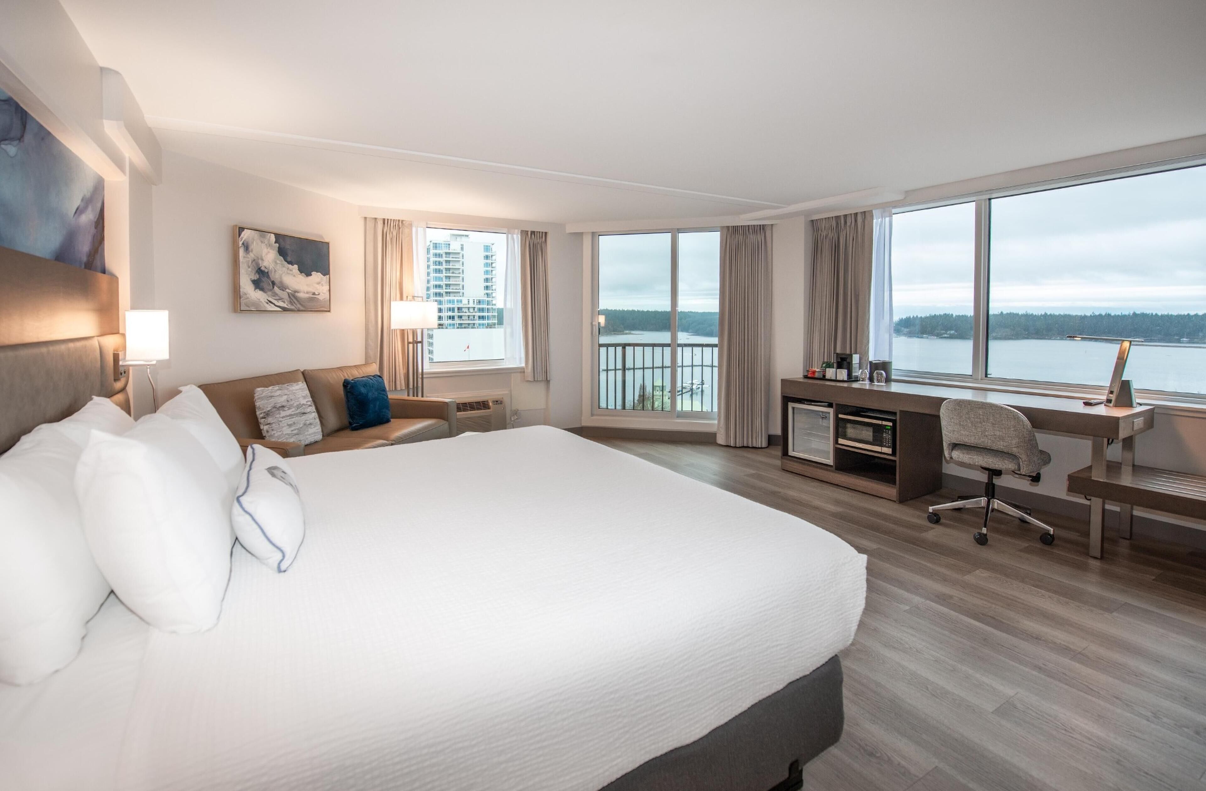 Room, 1 King Bed, Harbour View (Coast Premium King with Ocean View) | In-room safe, desk, blackout curtains, iron/ironing board