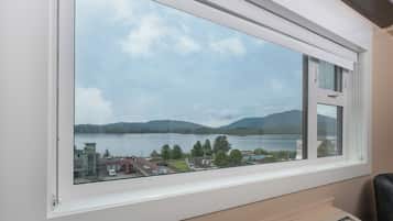 Signature Suite, 1 King Bed, Kitchenette, Ocean View | Premium bedding, blackout drapes, iron/ironing board, free WiFi