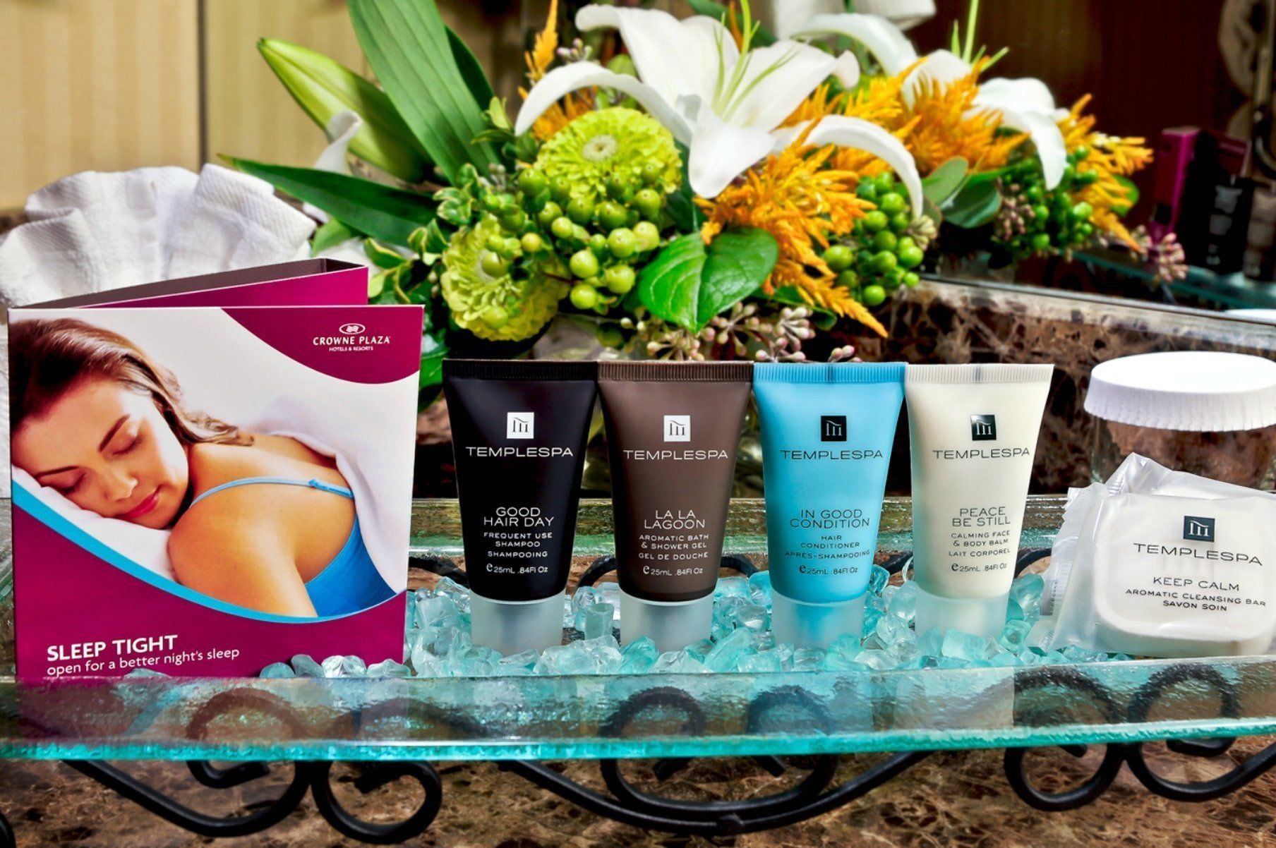 combined shower/bathtub, designer toiletries, hair dryer, towels