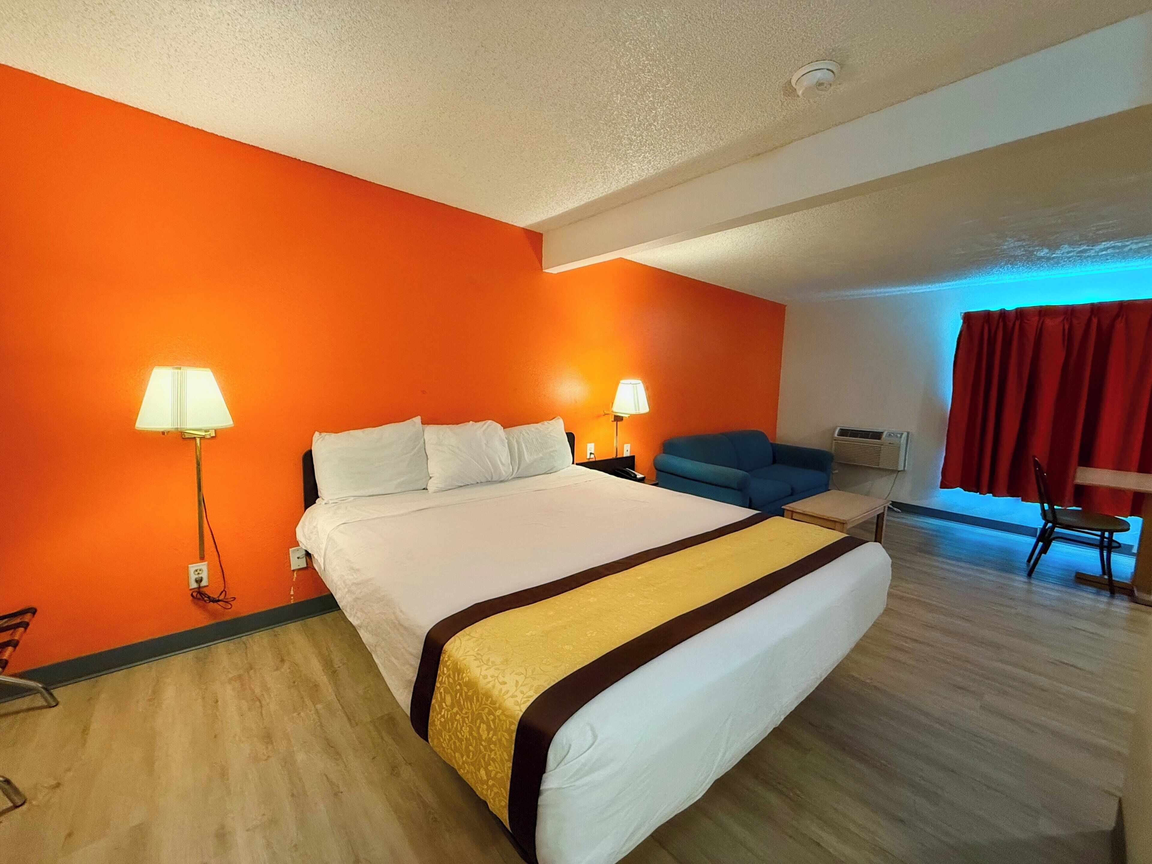 Premium Room, 1 King Bed, Kitchenette | Desk, iron/ironing board, free WiFi, bed sheets
