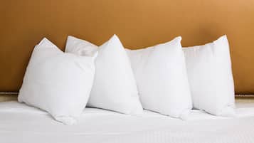 Premium bedding, pillow-top beds, desk, blackout curtains