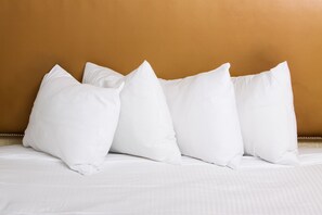 Premium bedding, pillow-top beds, desk, blackout curtains