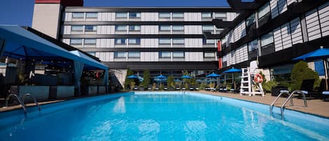 Seasonal outdoor pool, pool umbrellas, pool loungers