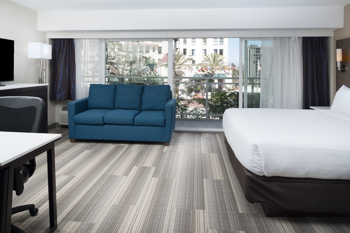Suite, 1 King Bed | Pillowtop beds, in-room safe, desk, blackout drapes