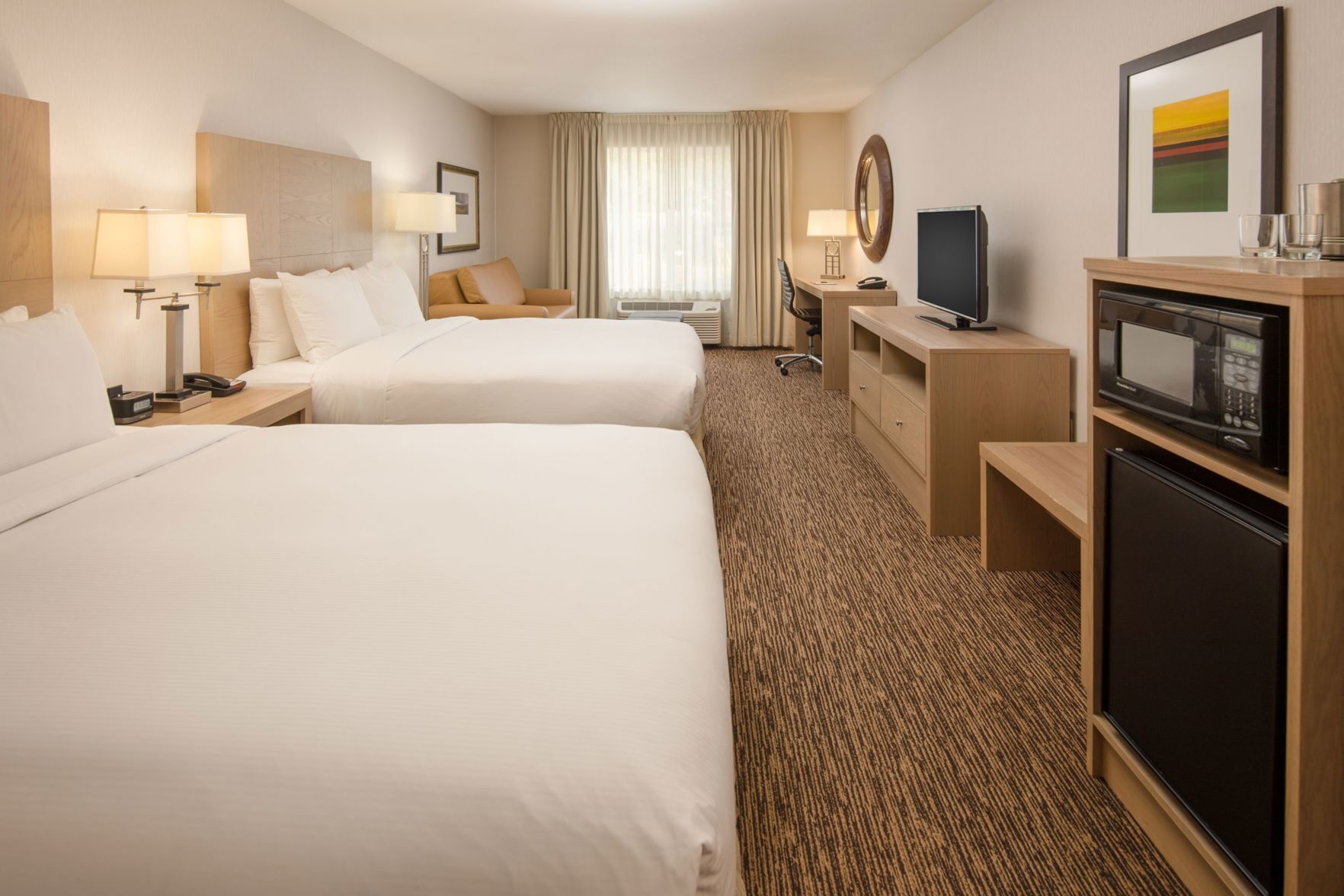 Premium bedding, down comforters, desk, laptop workspace