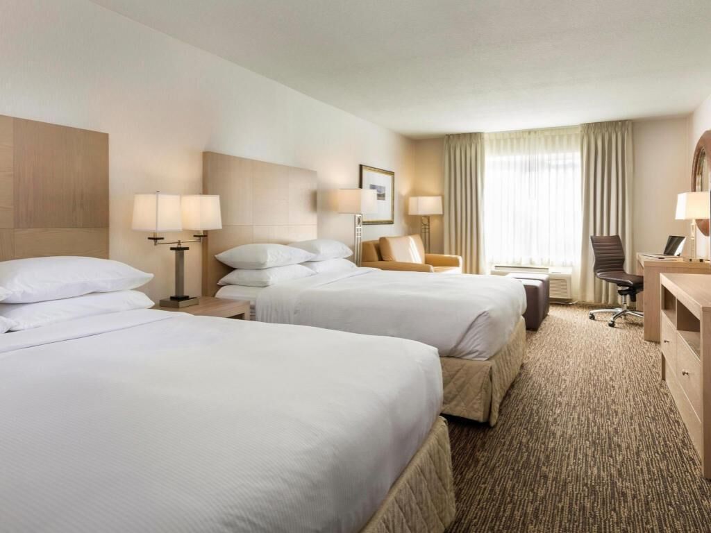 Premium bedding, down comforters, desk, laptop workspace