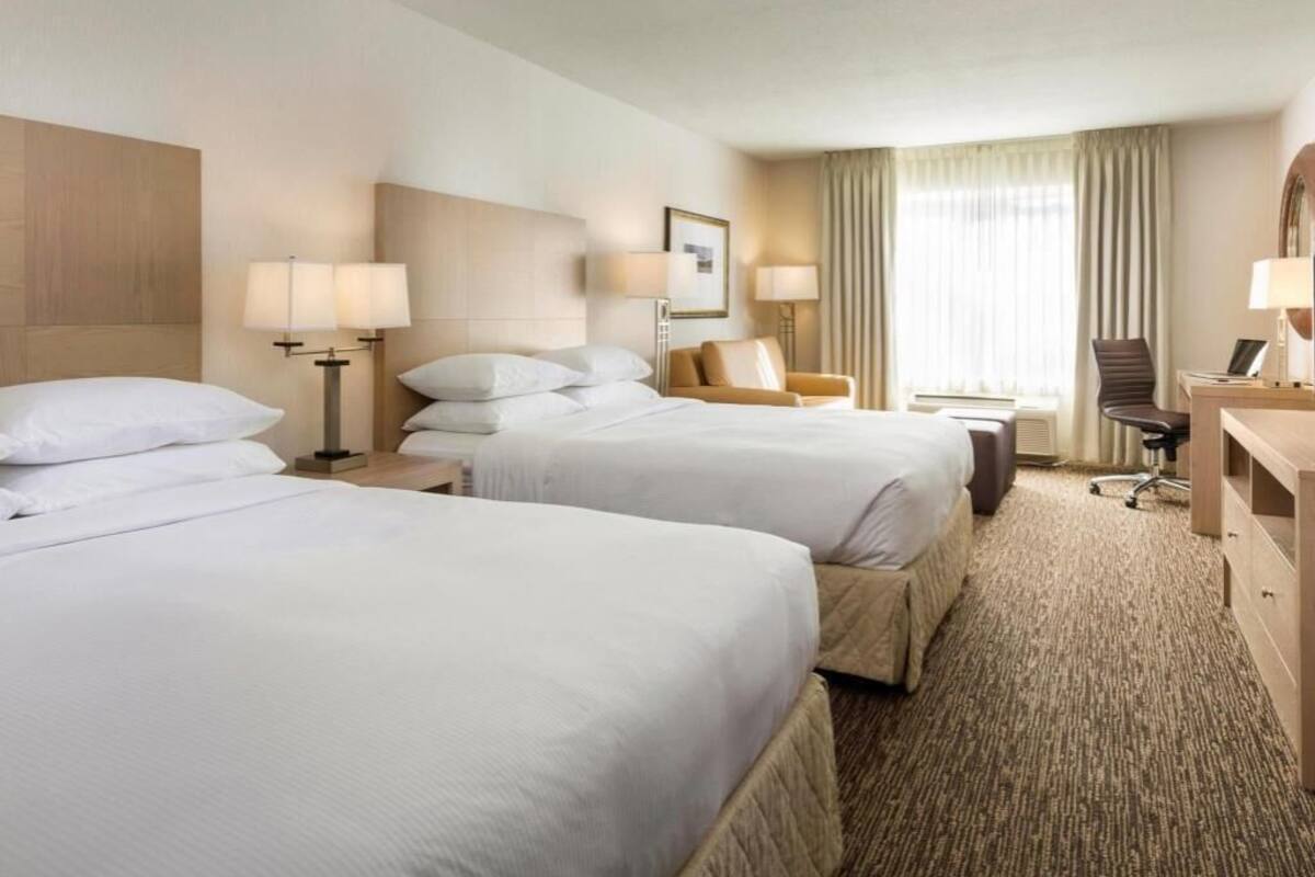 Premium bedding, down comforters, desk, laptop workspace