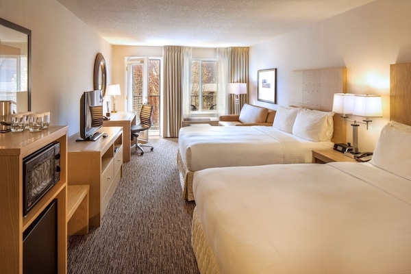 Premium bedding, down duvets, desk, laptop workspace