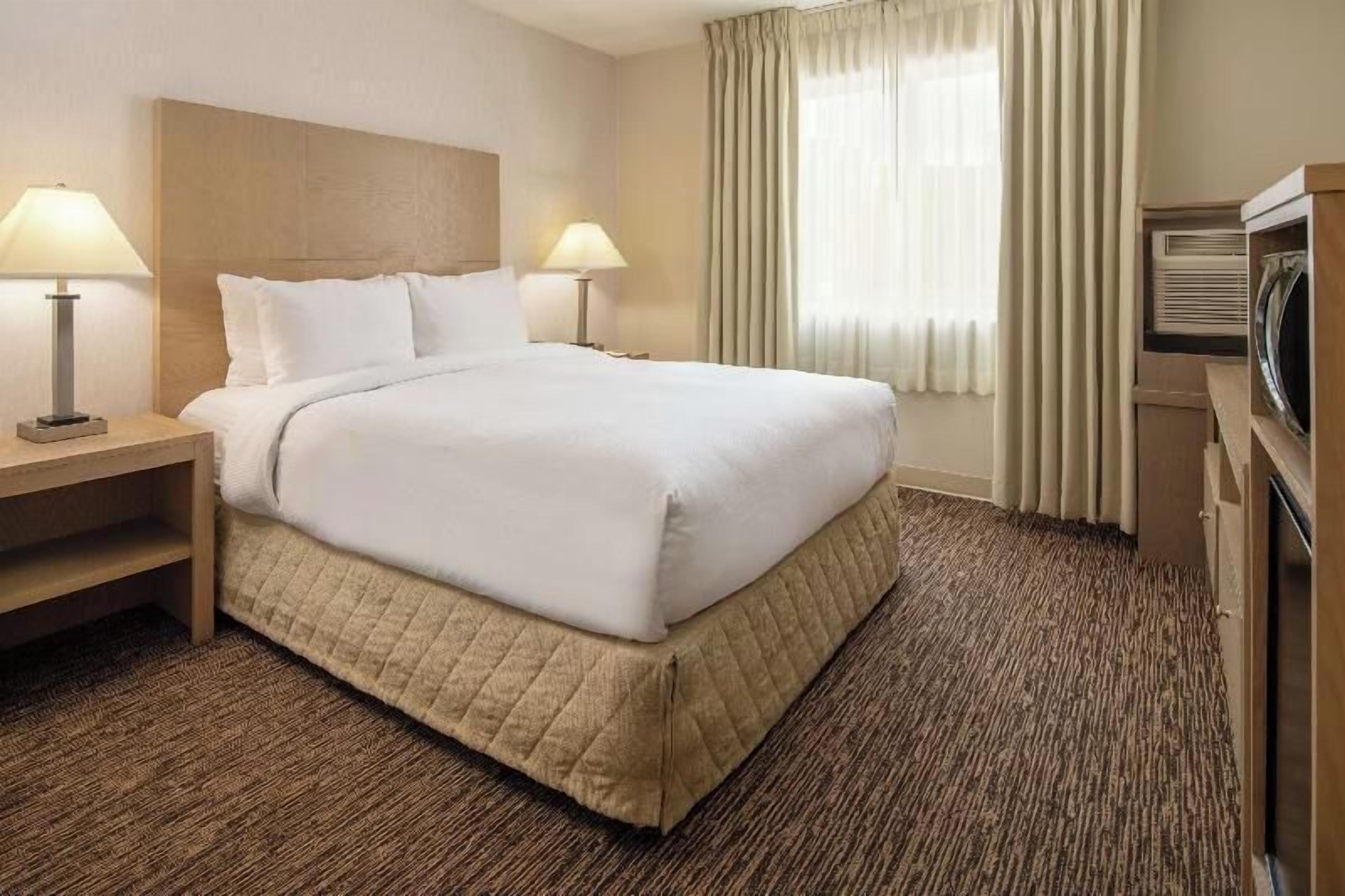 Premium bedding, down comforters, desk, laptop workspace