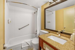 Room, 2 Double Beds, Non Smoking | Bathroom | Combined shower/tub, free toiletries, hair dryer, towels