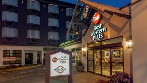 A hotel entrance with signage for Best Western Plus and White Spot. - Best Western Plus Vancouver Airport Hotel (Vancouver)