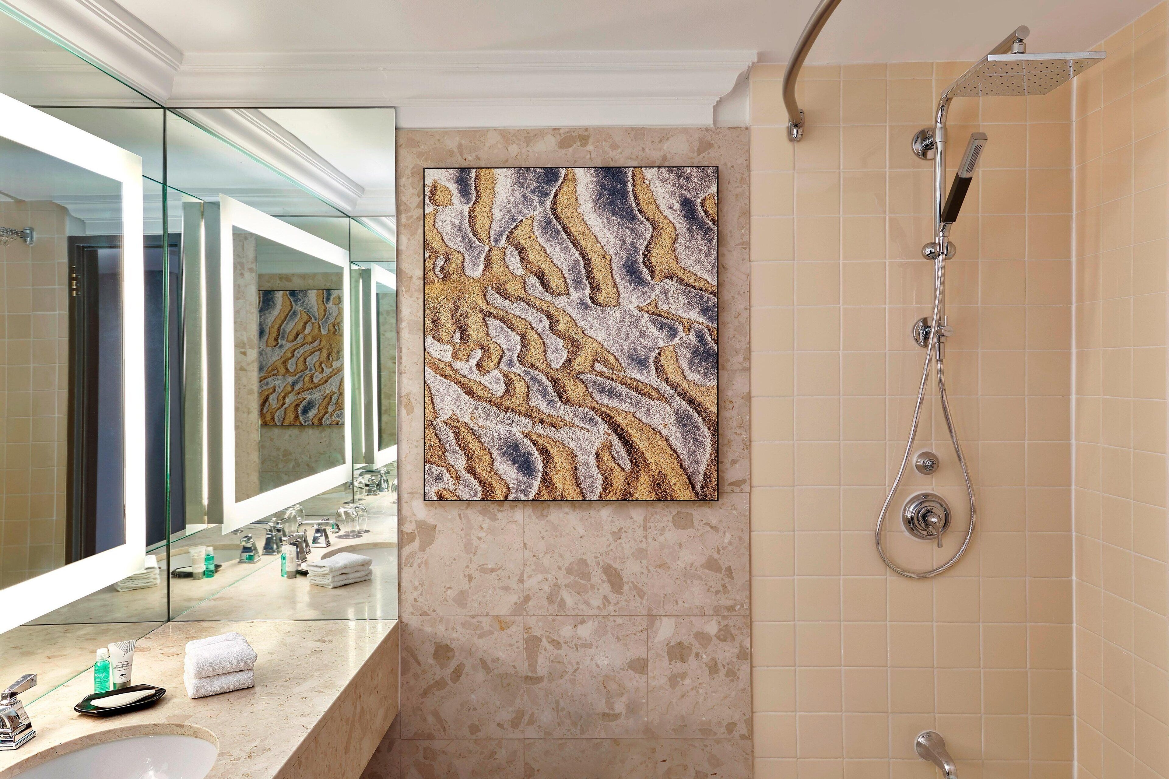 combined shower/bathtub, free toiletries, hair dryer, bathrobes