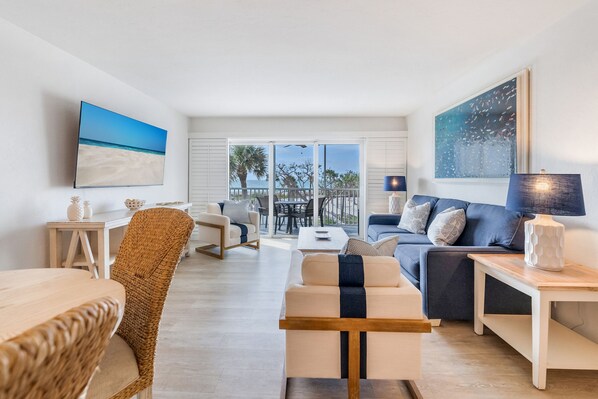 One Bedroom Beach Villa Deluxe | Living area | 40-inch TV with cable channels