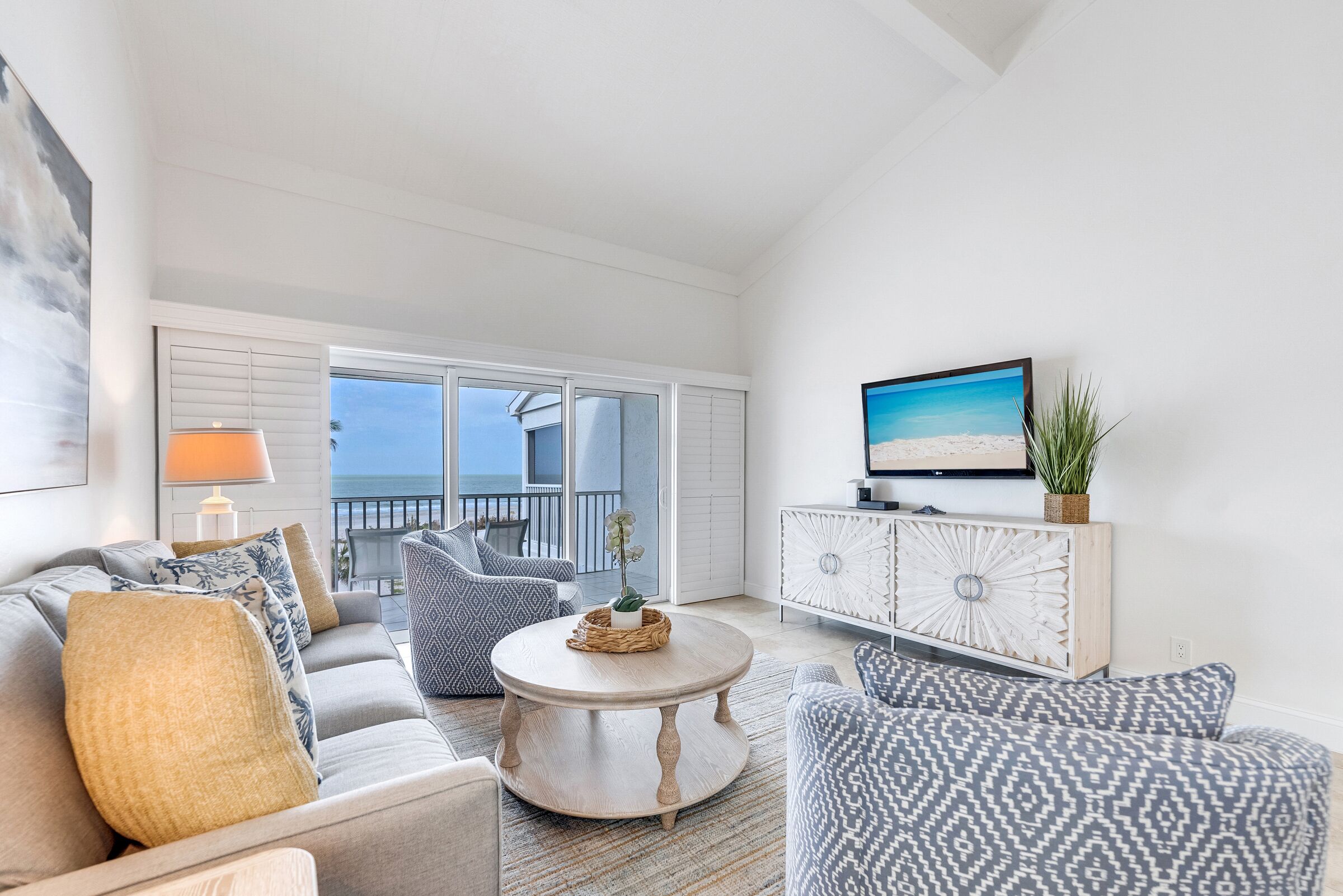 three bedroom beach villa deluxe | living area | 40-inch tv with cable channels