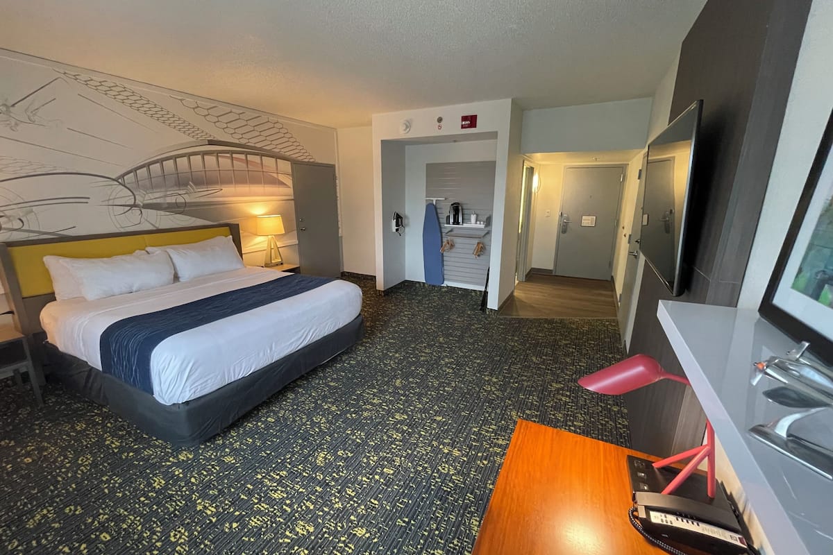 premium bedding, desk, laptop workspace, blackout curtains