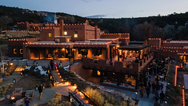 A large, multi-level building with outdoor seating areas and a patio. - Bishop's Lodge, Auberge Collection (Santa Fe)