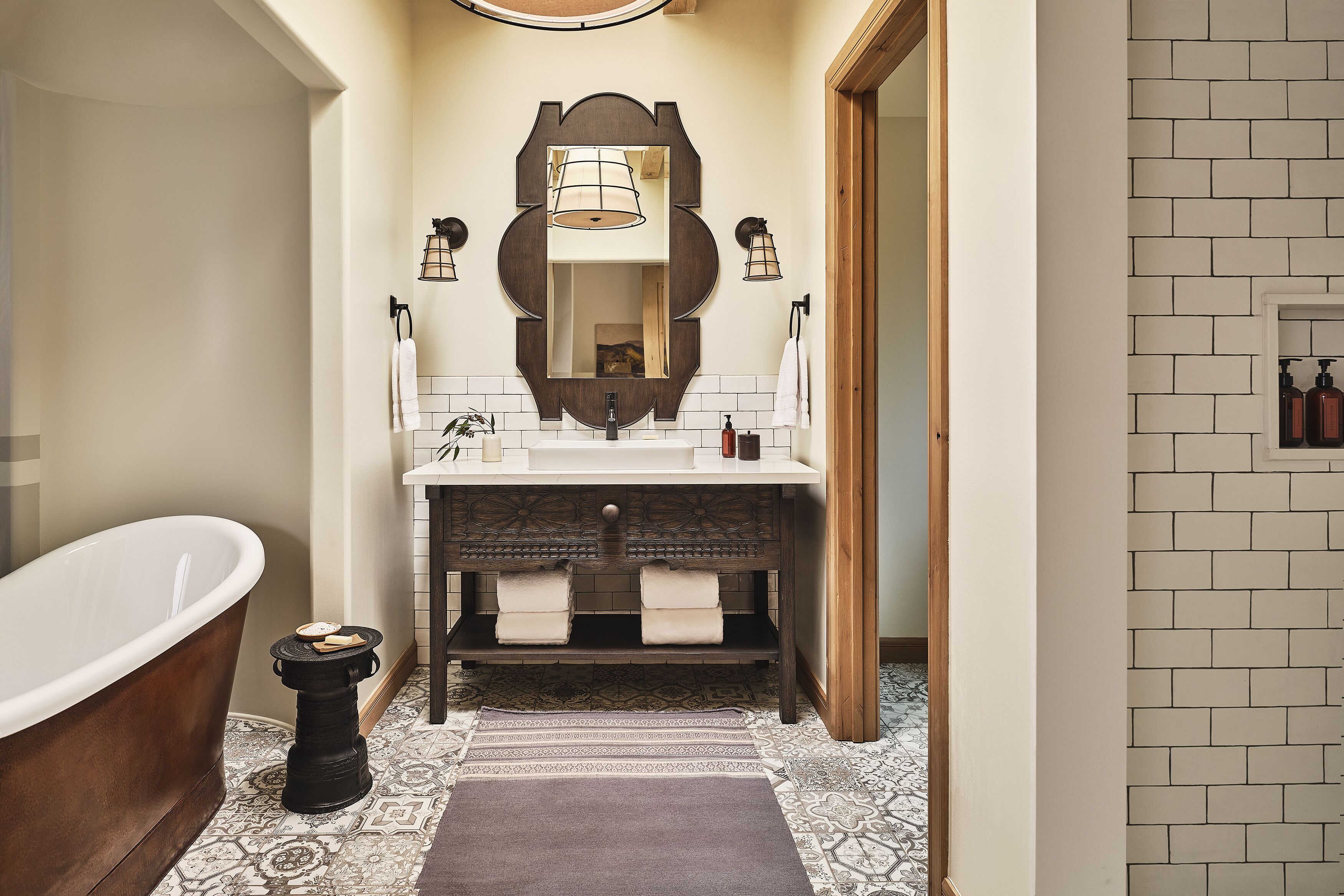 designer toiletries, hair dryer, bathrobes, slippers