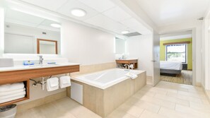 Suite, 1 Bedroom | Bathroom | Combined shower/tub, free toiletries, hair dryer, towels