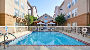 Outdoor pool, open 9:00 AM to 10:00 PM, pool umbrellas, pool loungers
