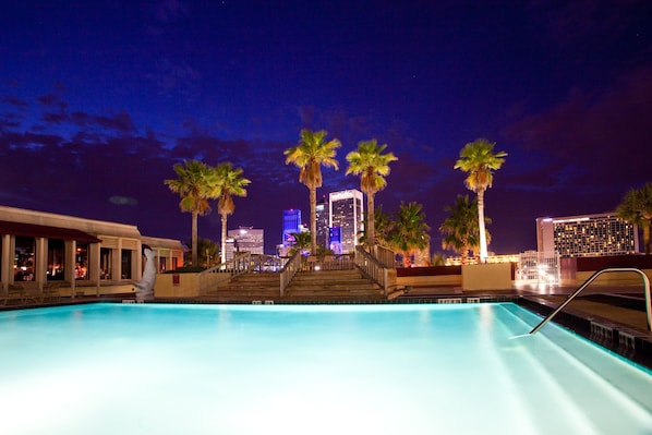 Outdoor pool, open 6 AM to 10:00 PM, free pool cabanas, pool loungers