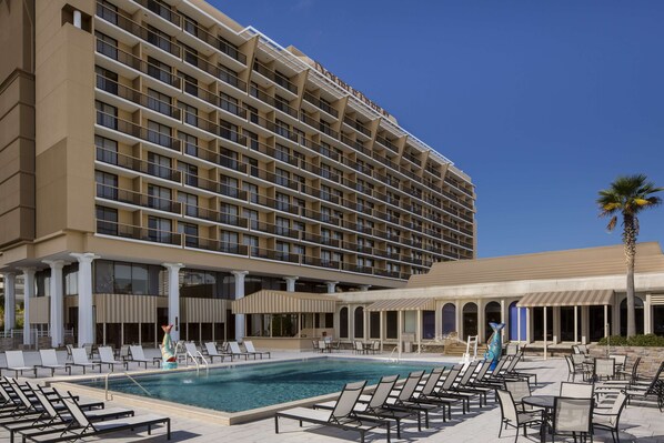 Outdoor pool, open 6 AM to 10:00 PM, free pool cabanas, pool loungers