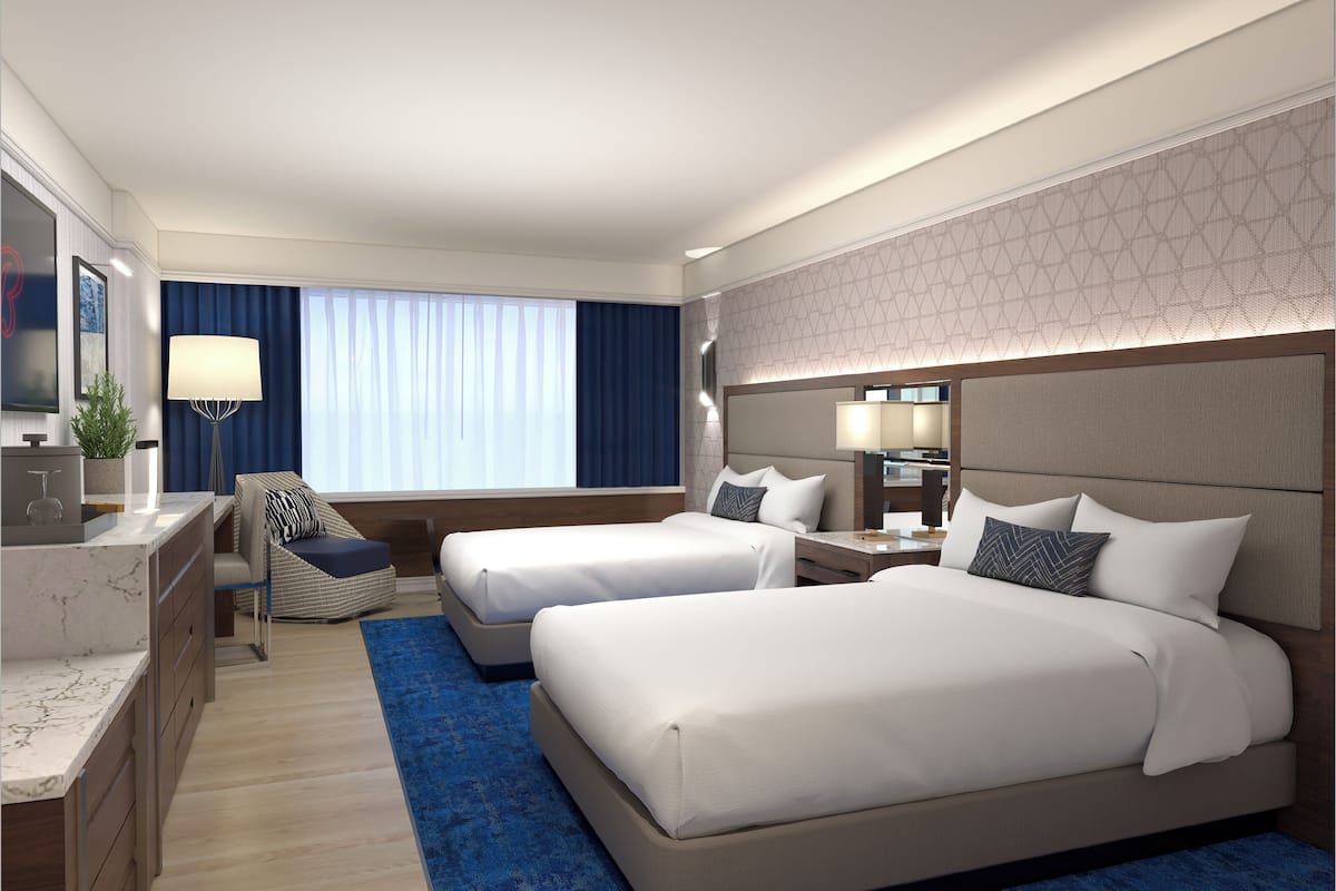 Chambre Junior, non-fumeurs, vue ville | Coffres-forts dans les chambres, bureau