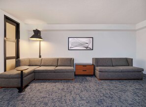 Premium bedding, desk, laptop workspace, blackout curtains