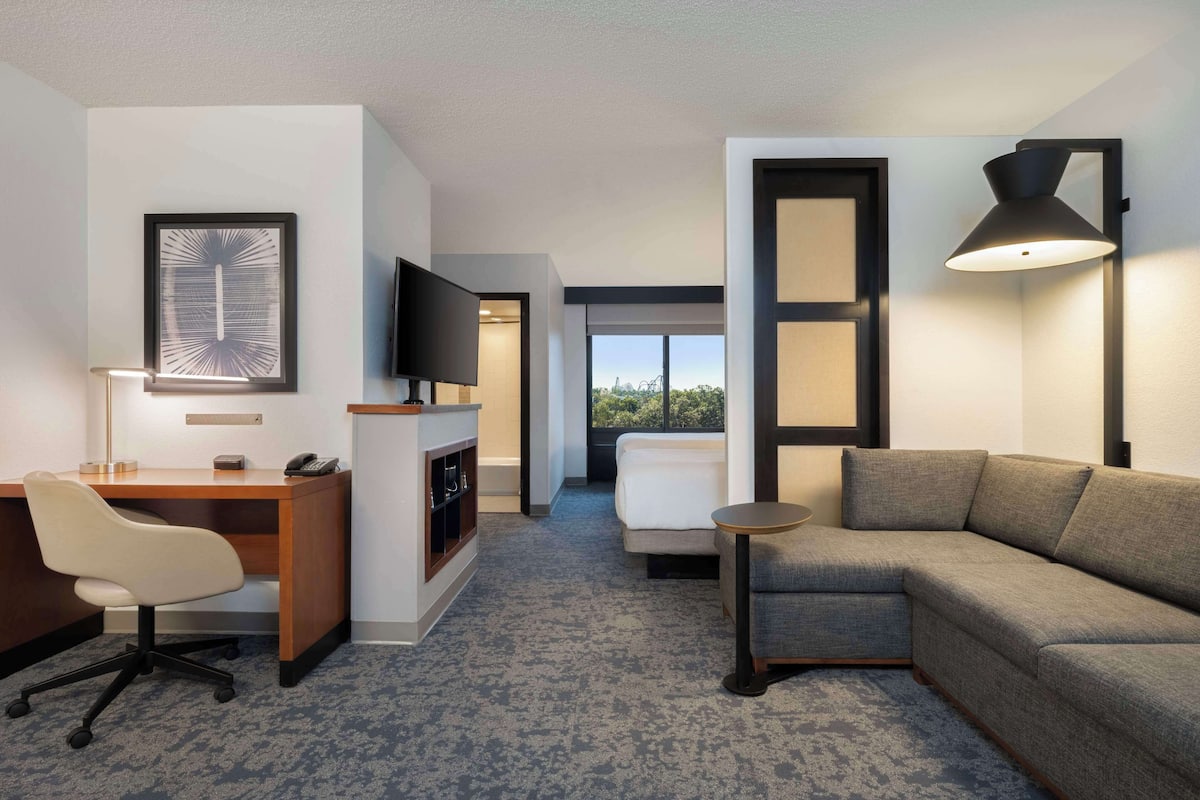 premium bedding, desk, laptop workspace, blackout curtains