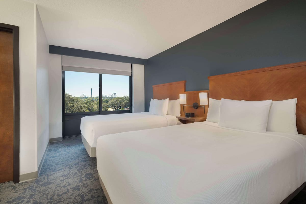 premium bedding, desk, laptop workspace, blackout curtains