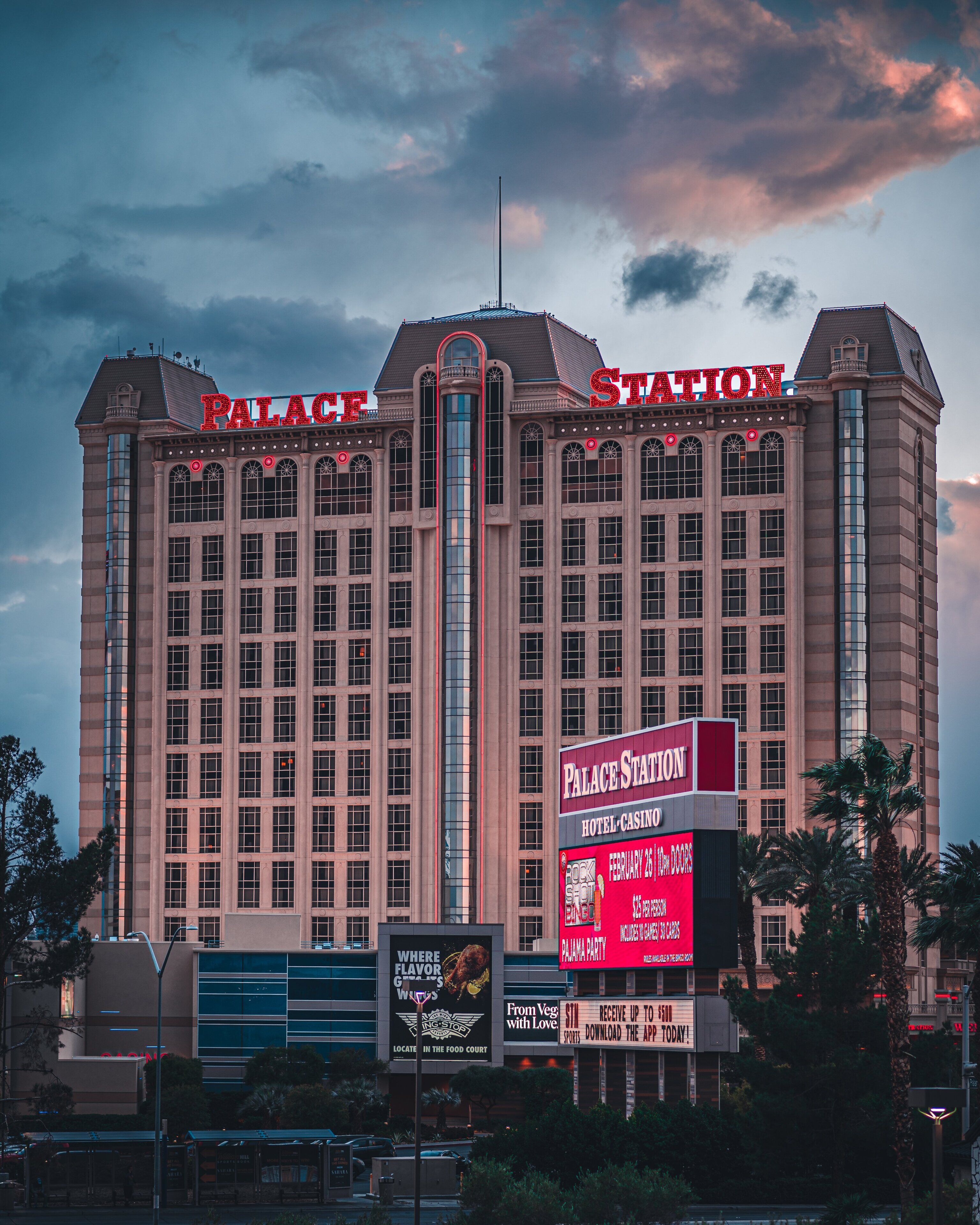 A large hotel with a prominent sign reading "Palace Station Hotel & Casino".