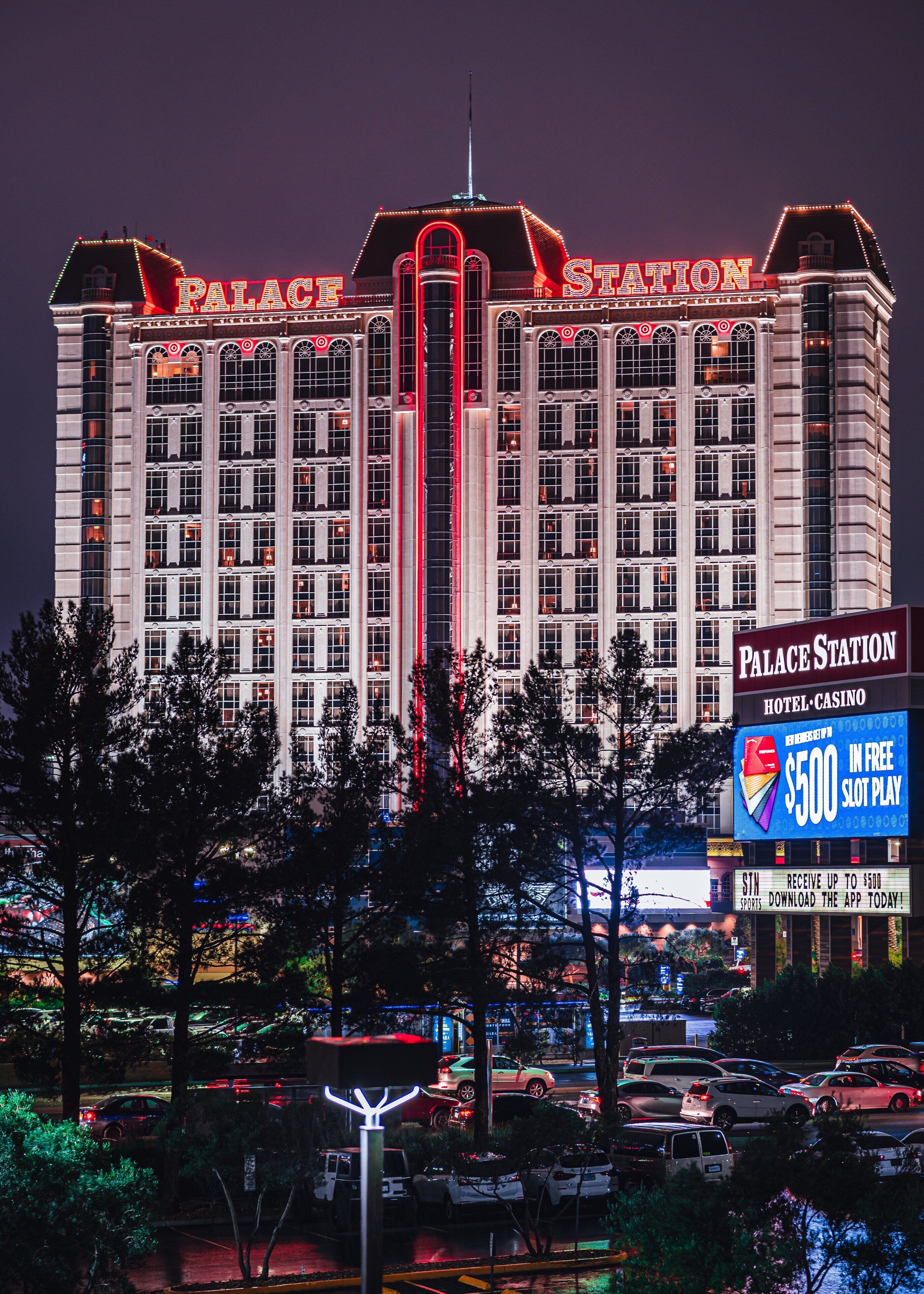 A large hotel with multiple floors and a prominent sign reading "Palace Station Hotel-Casino".