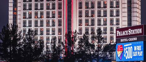 A large hotel with multiple floors and a prominent sign reading "Palace Station Hotel-Casino".