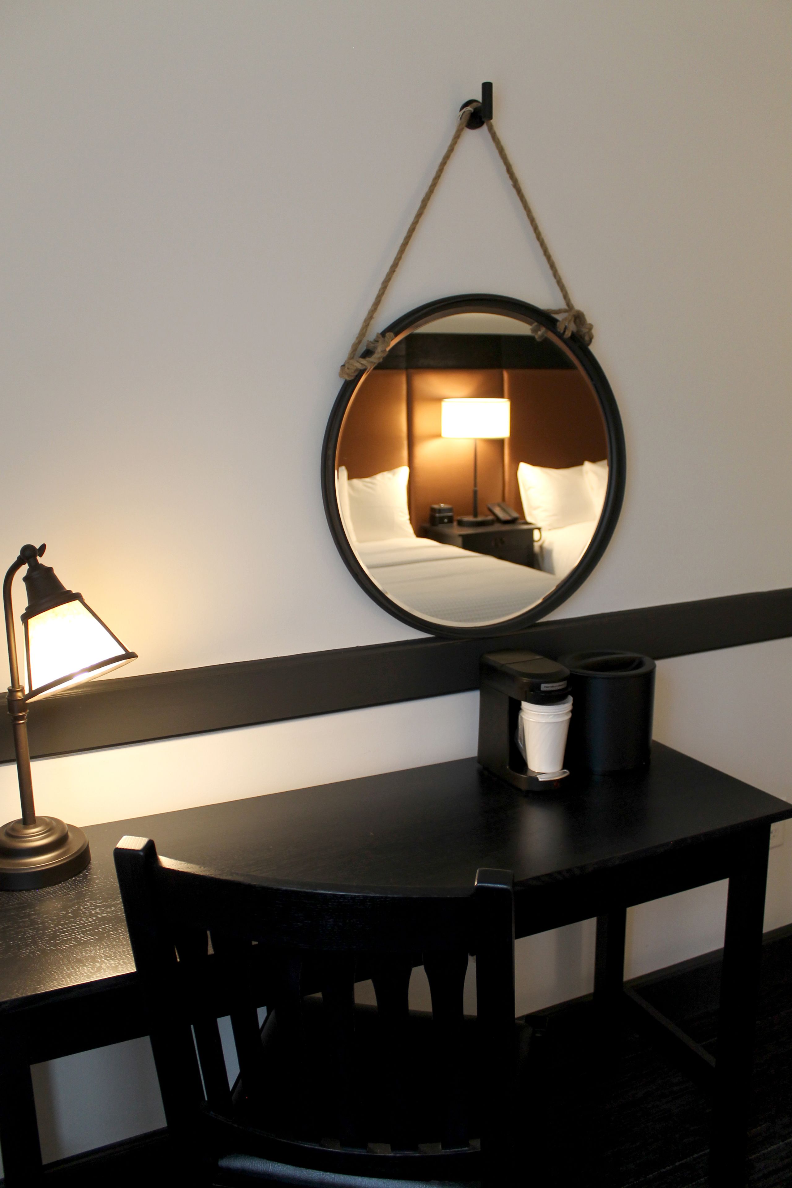 desk, laptop workspace, blackout curtains, iron/ironing board