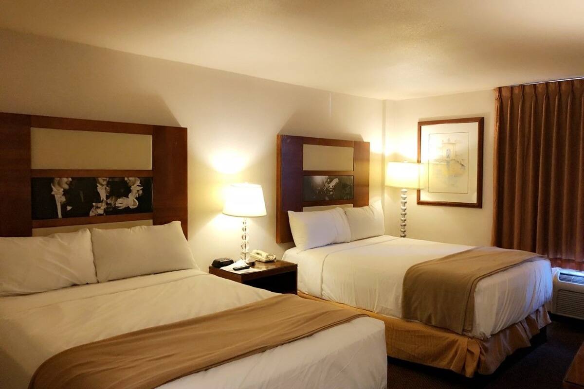 Deluxe Room, 2 Queen Beds (Non Smoking) | Desk, iron/ironing board, WiFi (free), bed sheets