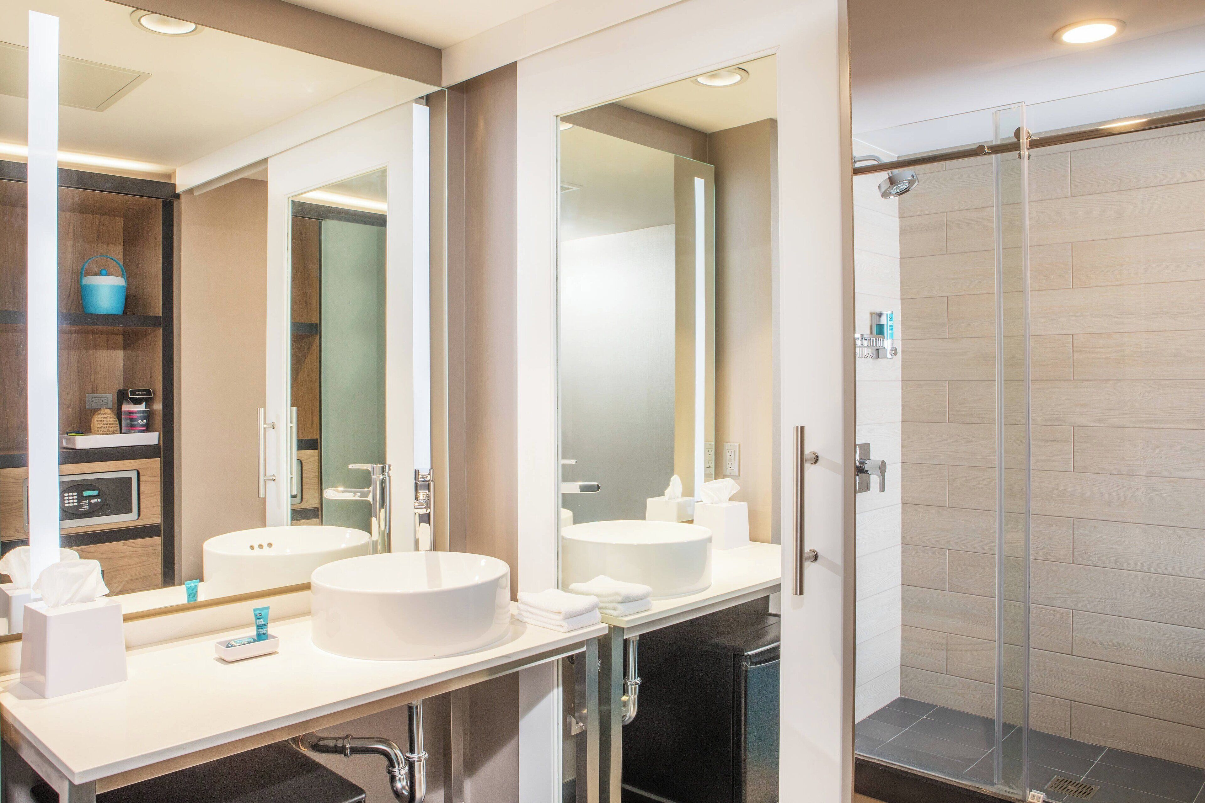 shower, rainfall showerhead, designer toiletries, hair dryer