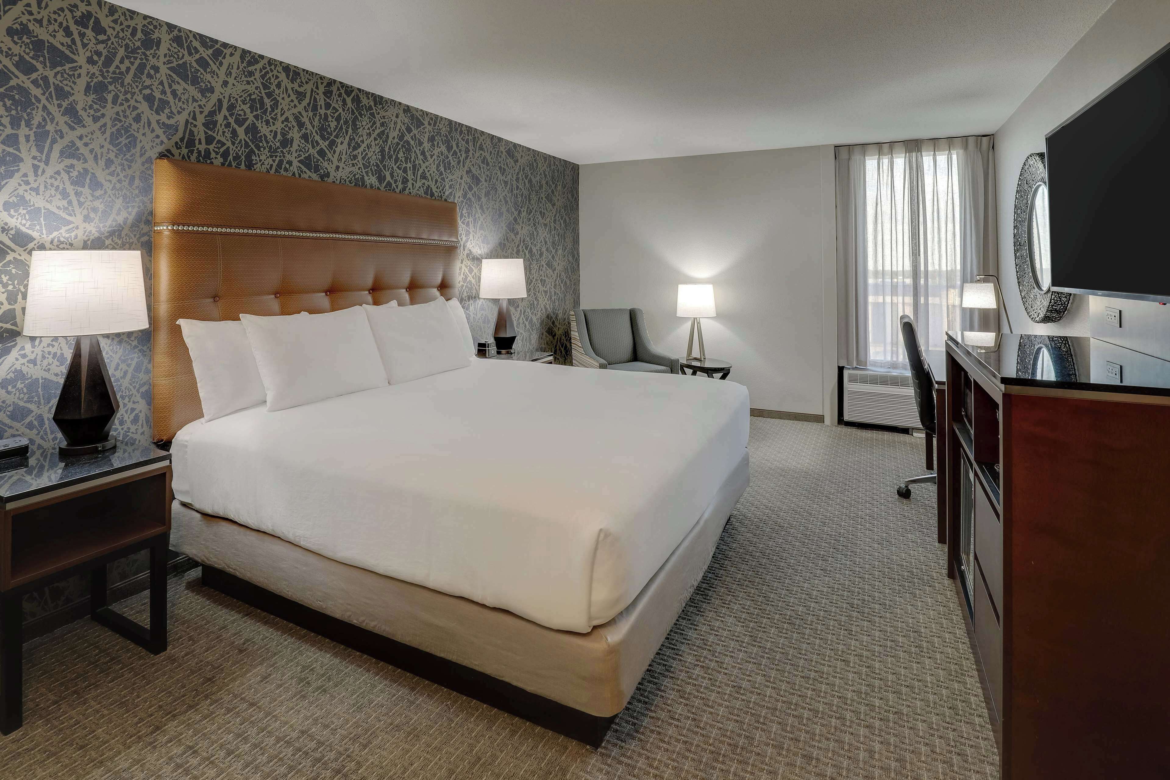 desk, laptop workspace, blackout curtains, iron/ironing board