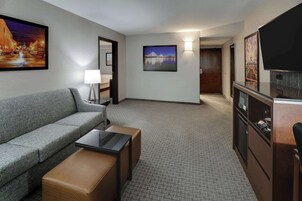 Desk, laptop workspace, blackout drapes, iron/ironing board