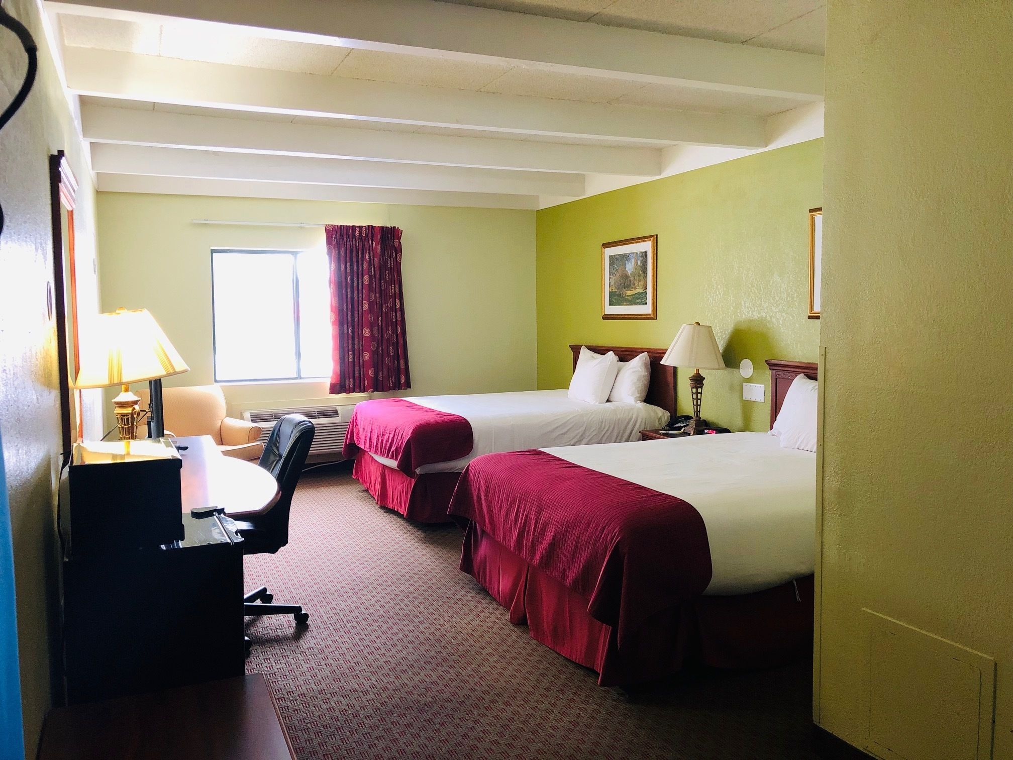 Premium bedding, desk, blackout drapes, iron/ironing board