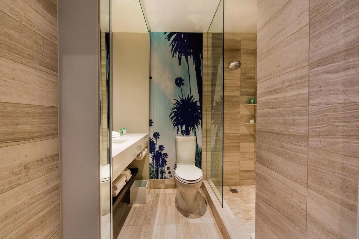 shower, rainfall showerhead, designer toiletries, hair dryer