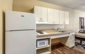 Studio, 1 Queen Bed, Accessible, Non Smoking | 1 bedroom, desk, laptop workspace, iron/ironing board