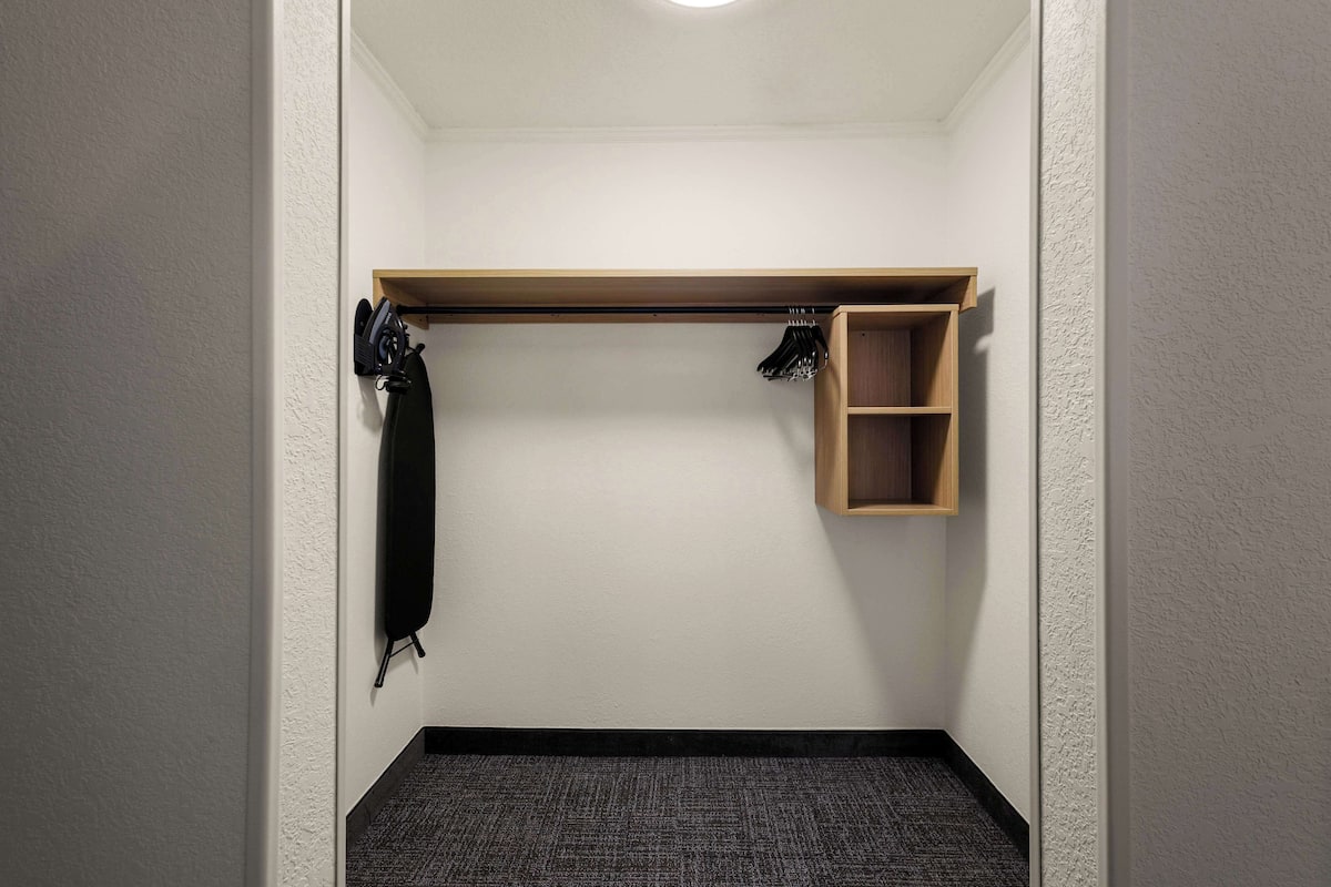 Suite, 1 Bedroom | Desk, blackout drapes, iron/ironing board, free WiFi