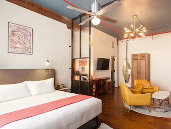 Suite, 1 King Bed with Sofa bed (Artist Loft Suite) | Premium bedding, down comforters, in-room safe, desk at The Old No. 77 Hotel & Chandlery