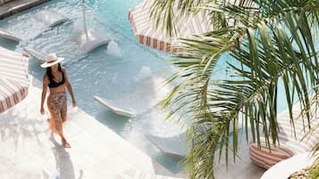 Outdoor pool, open 11:00 AM to 9:00 PM, pool umbrellas, sun loungers