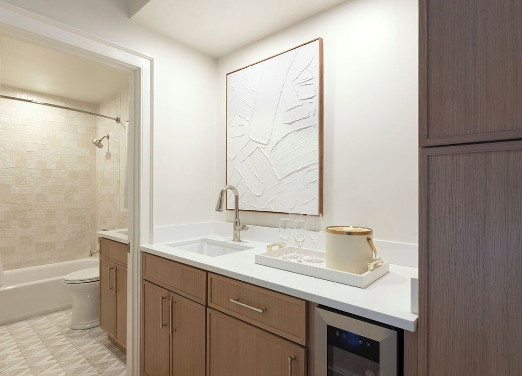 deluxe double room, multiple beds | bathroom | shower, designer toiletries, hair dryer, towels