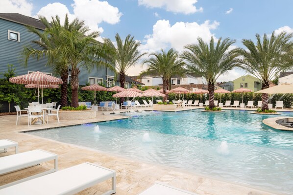 Outdoor pool, open 11:00 AM to 9:00 PM, pool umbrellas, pool loungers