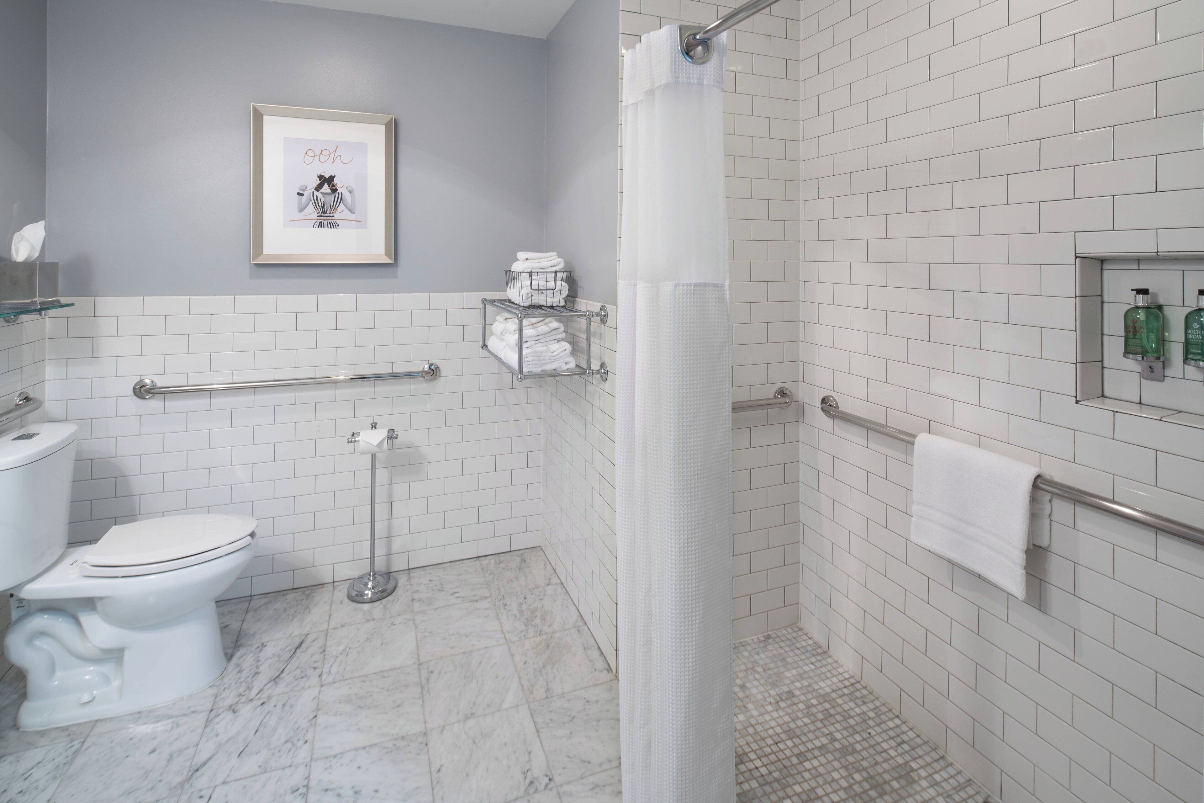 shower, designer toiletries, hair dryer, towels