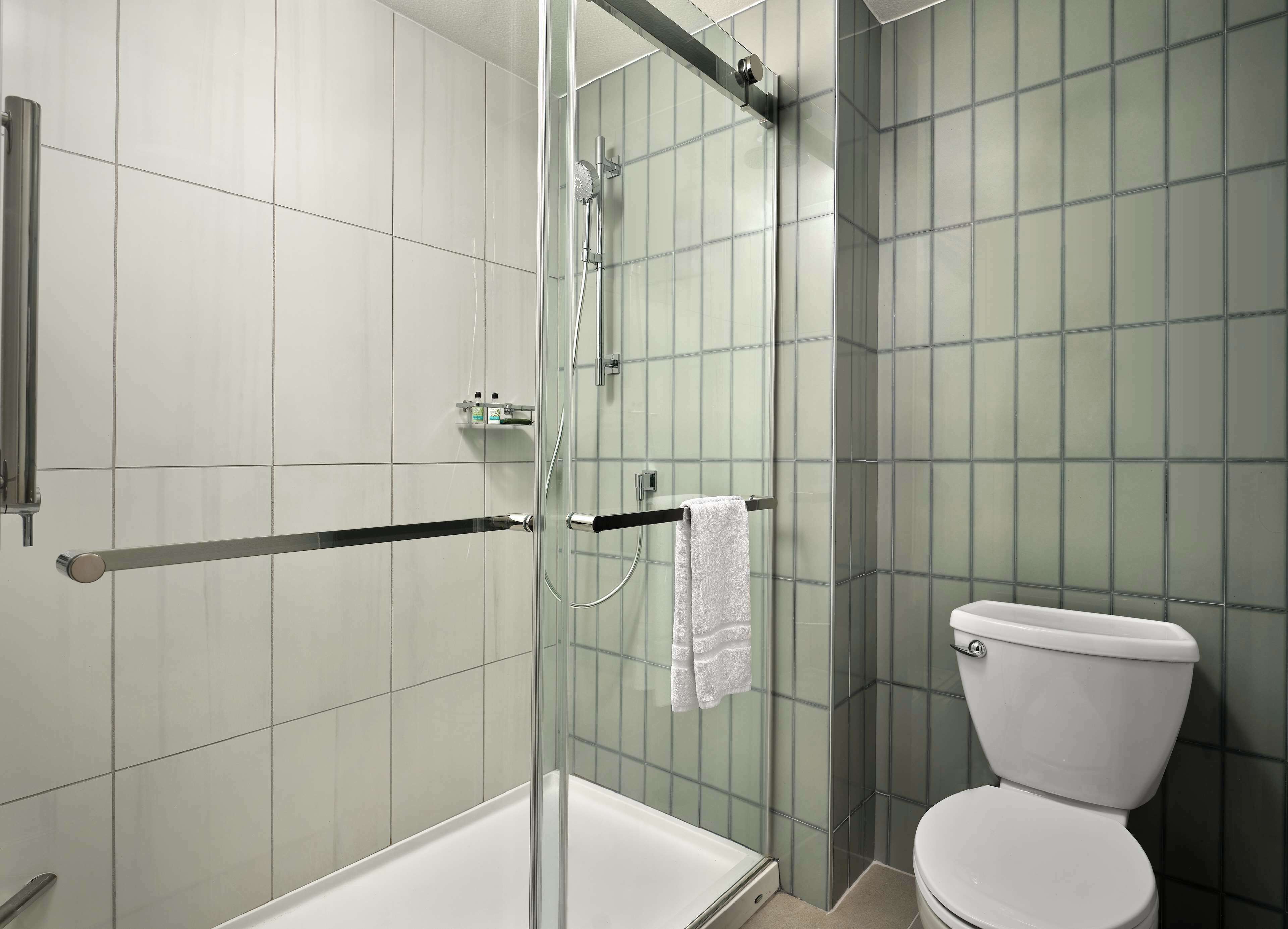 Designer toiletries, hair dryer, bathrobes, towels
