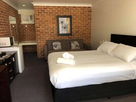 1 bedroom, desk, laptop workspace, iron/ironing board