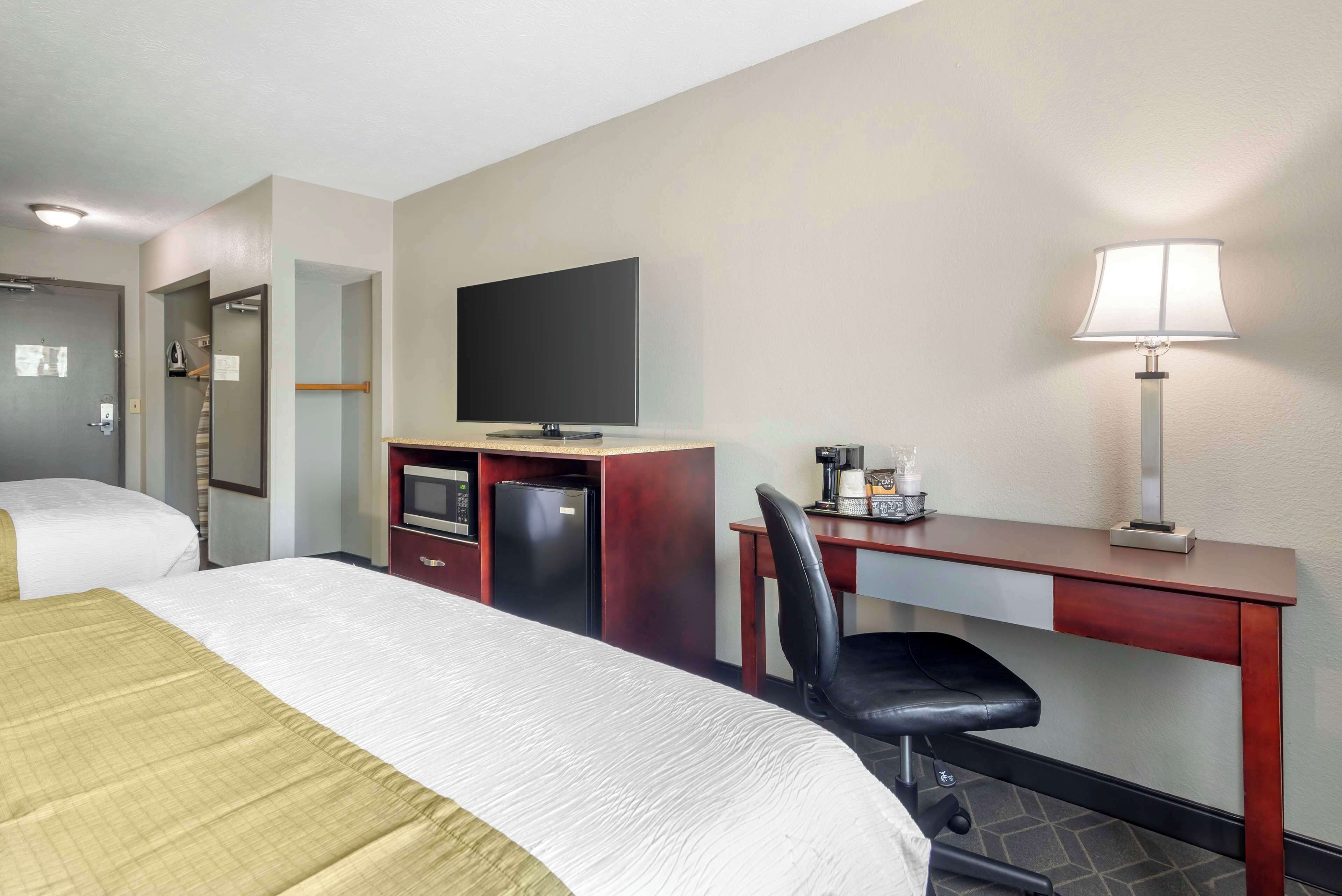 standard room, 2 queen beds, non smoking, refrigerator & microwave | pillow-top beds, desk, laptop workspace, blackout curtains