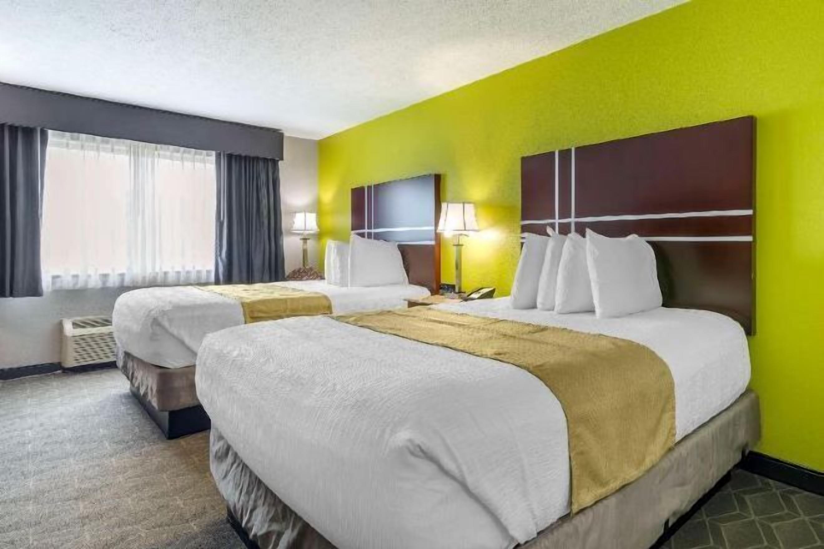 Pillowtop beds, desk, laptop workspace, blackout drapes